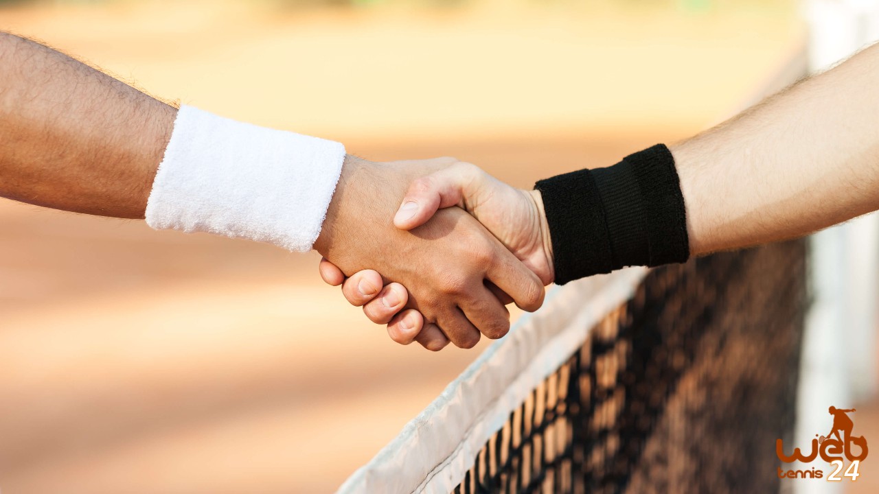 handshake at tennis net