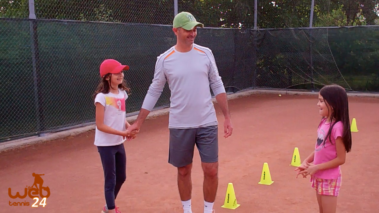 tennis coach with kids