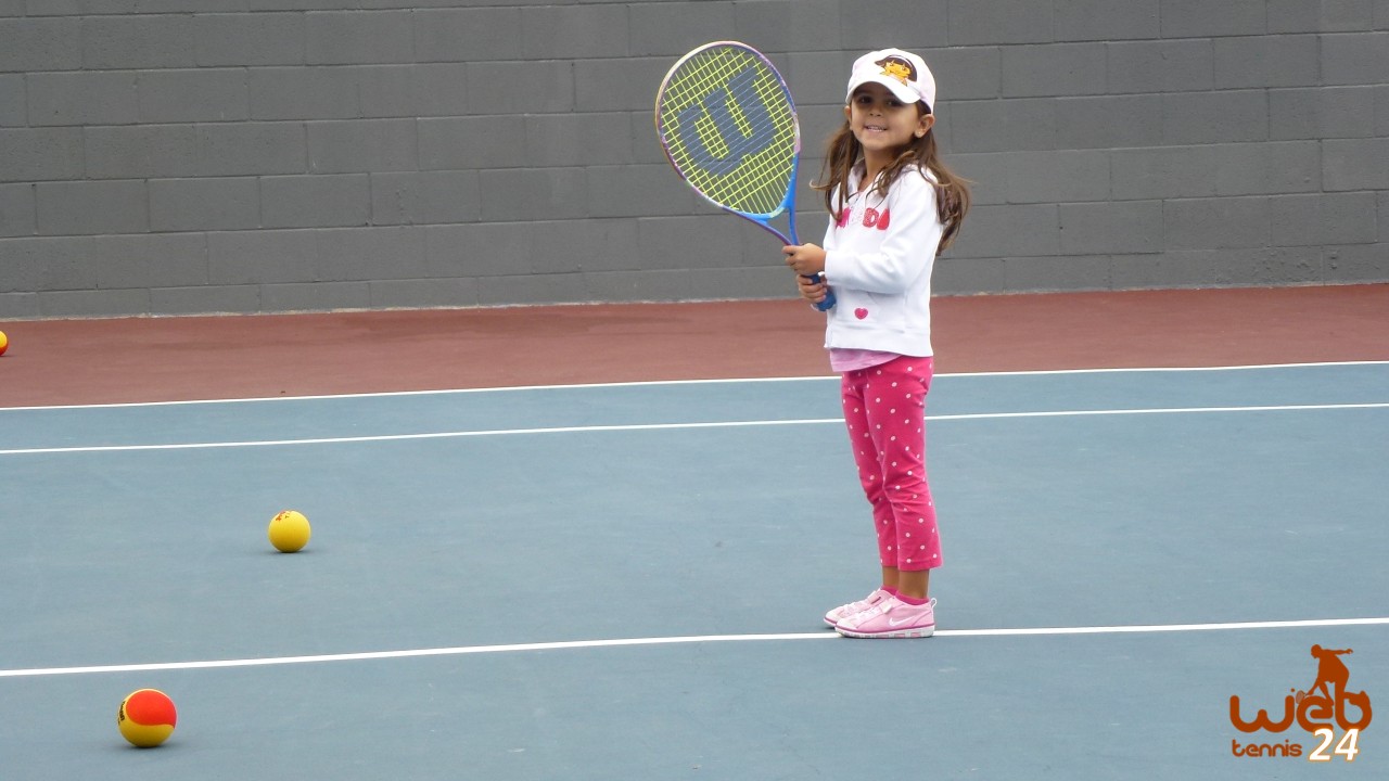 young tennis student