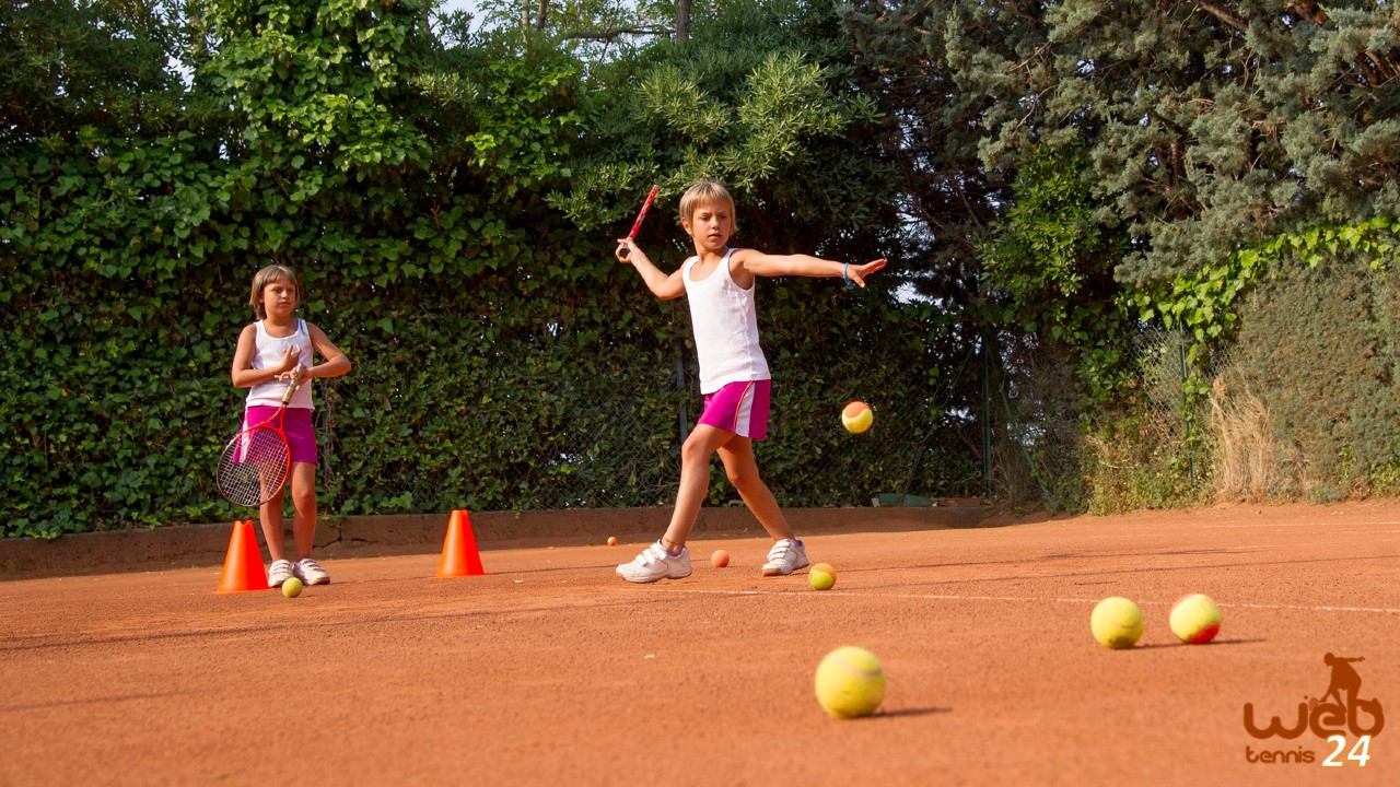 kids practicing tennis