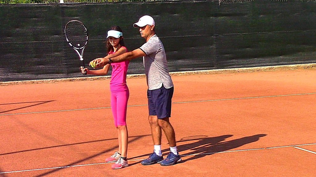 tennis coaching / contact point fix