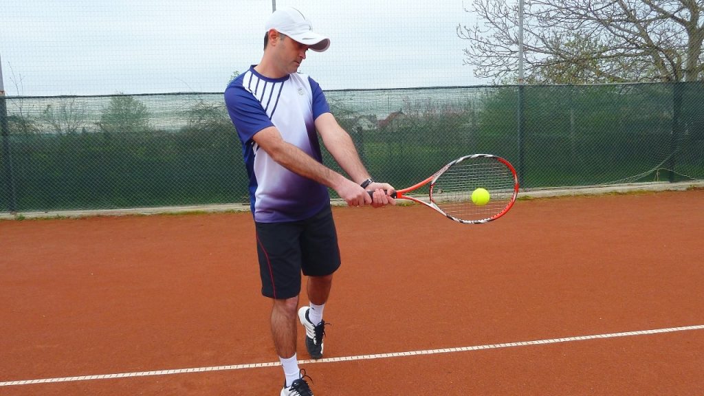 two-handed backhand contact point